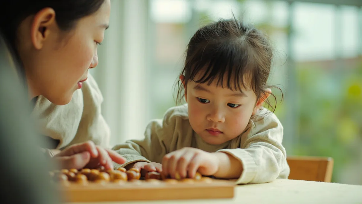 A child practices arithmetic on a wooden abacus, illustrating “plus, minus, times, divided” in Chinese: 加减乘除 (jiājiǎn chéngchú)